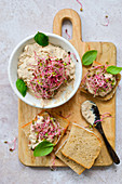 Breakfast paste with tuna and sardines wooden board and slices of bread