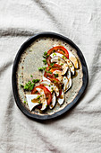 Porcini mushroom and tomato carpaccio with brown butter, lemon and chervil