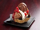 Waffle cup with chocolate ice cream and whipped cream