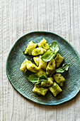 Fiery gnocchi with roasted lemon oil and basil