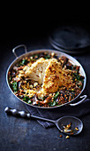 Whole roasted cauliflower with red wine, shallots and wheatberries