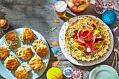 Coronation chicken scones, Potted shrimp tart with shaved rainbow beet salad