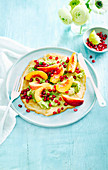 Almond crêpes with avocado and nectarines
