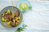 Turkish lamb chops with quinces and rosemary potatoes