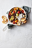 Baked vegan 'feta' with white wine and olives