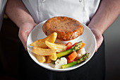 Pie with vegetables and potato wedges