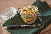 White cabbage salad with carrots, spring onions and dill