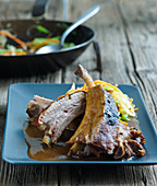 Grilled ribs with vegetables and plum sauce (Asia)