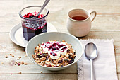 Muesli with blackcurrant compote