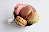 Bowl of macaroons on table