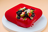 Red cake with fresh berries
