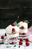 Quark dessert with cherries and ladyfingers