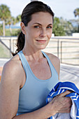 A brunette woman after a workout