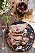 Buckwheat crepes with fruits and jam