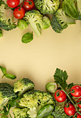 Vegetables food pattern made of broccoli, Brussels sprouts, tomatoes, herbs