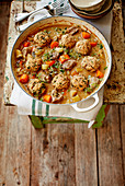 Pork and apple stew with parsley & thyme dumplings