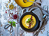Parsnip Soup with pomegranate, pumpkin seeds and coriander