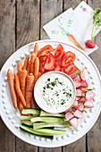 Healthy vegetable plate with a quark dip