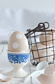 Blown egg decorated with white spots