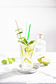 A summer Moscow Mule with cucumber, lime and basil