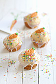 Easter carrot muffins with colourful sprinkles