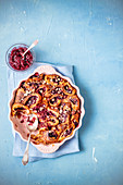 Bread pudding with jam and hazelnuts