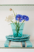 Cornflowers and Queen Anne's lave in vintage drinking glass