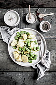 Potato and broad beans salad served with yoghurt