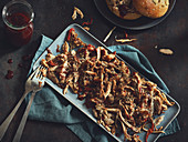 Pulled chicken made in a Dutch oven