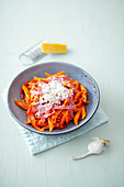 One-pot penne pasta with a pepper and salami sauce