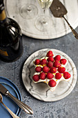 A star shaped ricotta cake with raspberries