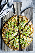 Roasted potato pizza with shaved brussels sprout slaw