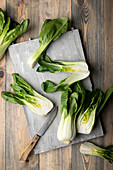 Pak choy on cutting board with knife
