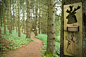 A stag motif on the Dollbergschleife hiking trail, Saarland, Germany