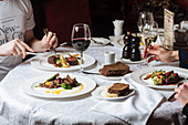 Men having dinner in luxury restaurant