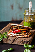 Vegan waffle sandwich with grilled vegetables and pesto