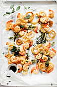 Fried seafood and onion rings in tempura batter with sage leaves