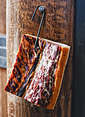 Bacon on a meat hook
