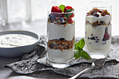 Yogurt muesli with berries in a glass