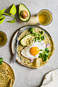Chickpea flour pancakes with avocado and fried egg