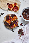 Canied blood orange slices with chocolate