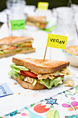 Vegan whole grain sandwich with chickpea spread