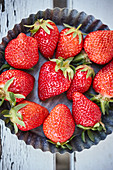 Fresh strawberries in a baking pan