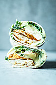 Wraps with chicken breast, arugula and honey mustard sauce