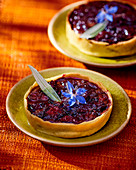 Olive tart with chocolate and cherries
