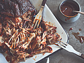 Pulled pork cooked in a smoker