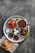 Traditional Egyptian breakfast variations, Foul and falafel with pickled tomatoes
