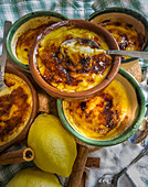 Crema Catalana, lemons and cinnamon sticks