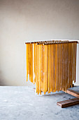 Pasta Drying on Wooden Rack