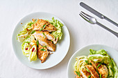 Sesame chicken salad with lettuce wedges and honey dressing